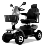 Wimed – Motorino elettrico per invalidi e anziani con struttura medio/piccola, cestino portaoggetti, braccioli ribaltabili, 4 ruote e luci led. Scooter disabili mod. Fox con portata da 150kg